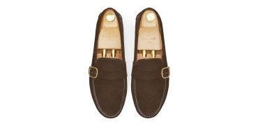 Loafers with side boucles. Comfortable brown leather moccasins for summer
