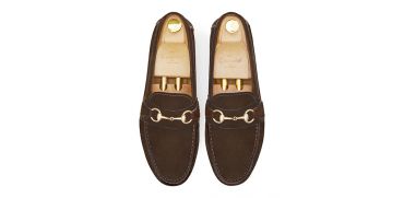 Loafers slip on buckle. Comfortable brown leather moccasins for summer